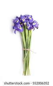 Iris flowers bouquet tied with rope isolated on white top view. Floral gift concept. Top view