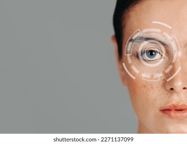 Iris identification. Artificial intelligence system doing a biometric scan on a woman’s eyes. Using modern technology to make access and security better.