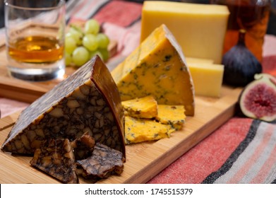 Irish Brown Porter Cheese, Blue Cheese And Tasting Glass Of Single Pot Still Whiskey From Ireland Close Up