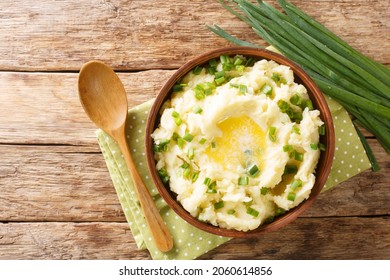 Irish Champ Is A Simple Food Made Of Potatoes, Milk, Green Onions, Butter Close Up In The Bowl On The Table. Horizontal Top View From Above
