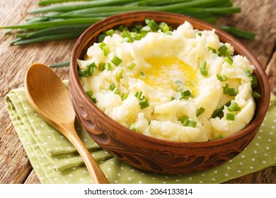 Irish Champ Is A Simple Food Made Of Potatoes, Milk, Green Onions, Butter Close Up In The Bowl On The Table. Horizontal
