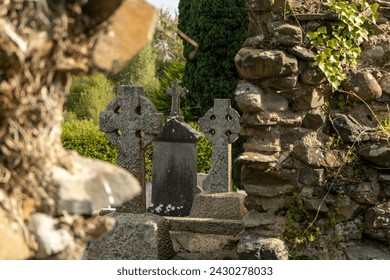 Irish church ruins with cemetery - old abandoned gothic religious building 