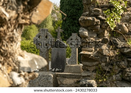 Irish church ruins with cemetery - old abandoned gothic religious building 