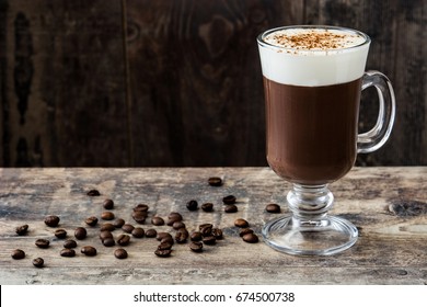 Irish Coffee In Glass On Wooden Table
