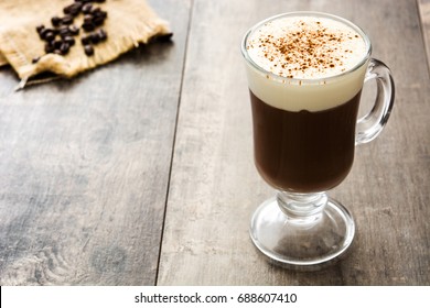 Irish Coffee In Glass On Wooden Table
