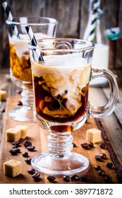 Irish Coffee In Mugs On Wooden Table