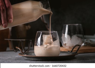 Irish Cream Coffee Liqueur With Ice On Dark Background