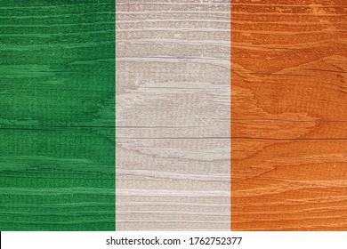 Irish flag with wood texture. Flag of Ireland on wood texture