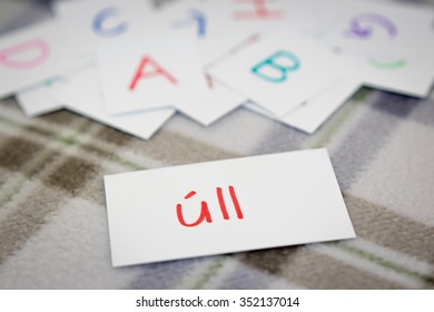 Irish; Learning The New Word With The Alphabet Cards (Translation; Apple)