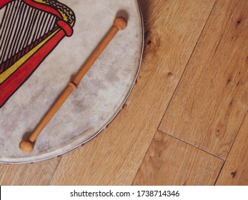 An Irish Bodhrán On A Wooden Floor