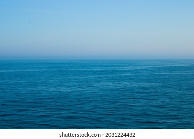 Irish Sea Seascape With Blue Sky And Mist In The Background