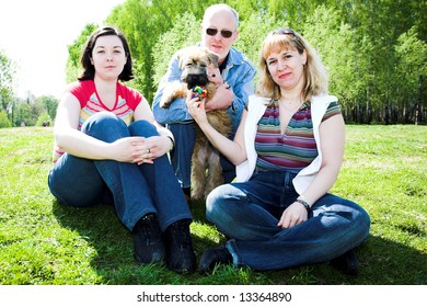Irish Soft Coated Wheaten Terrier Dog And Family
