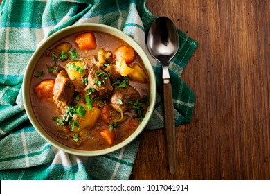 Irish stew made with beef, potatoes, carrots and herbs. Traditional  St patrick's day dish. Top view - Shutterstock ID 1017041914