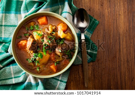 Irish stew made with beef, potatoes, carrots and herbs. Traditional  St patrick's day dish. Top view