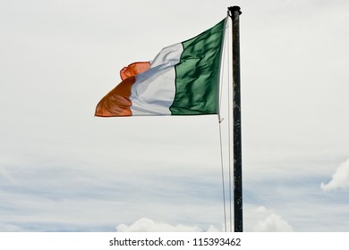 The Irish Tricolour Flag Flying From A Flag Pole