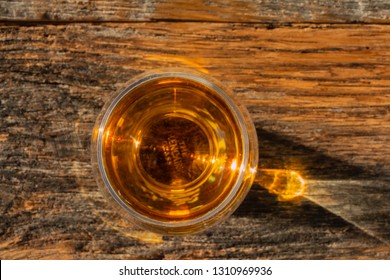 Irish Whiskey Glass On Old Wood Table Overhead Shot