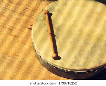 The Irish Bodhrán With A Wooden Floor Background 