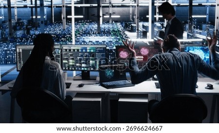 Irked data center programmer smashing desk, upset by malfunctioning gear while using AI tech. Mad server hub IT expert disgruntled by errors in glitching artificial intelligence software, camera A