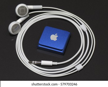 IRKUTSK, RUSSIA - JANUARY 31, 2017: New Audio Player IPod Shuffle 4th Generation And Standard Headphones Unpacked In The First Day After Buying. Produced By Apple Inc.