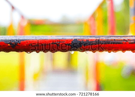 Iron bar for children climbing with water drops