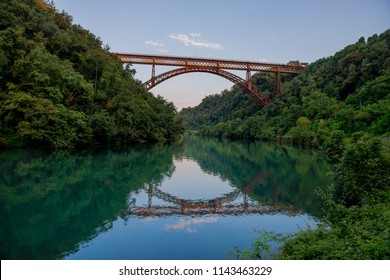 iron bridge on the river adda - Shutterstock ID 1143463229