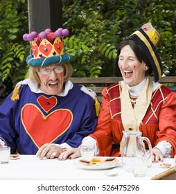 Iron Bridge, Telford, UK - July 21, 2012: Alice In Wonderlands Mad Hatters Tea Party. Queen Of Hearts, King Of Hearts.
