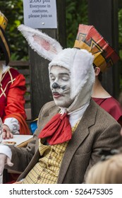 Iron Bridge, Telford, UK - July 21, 2012: Alice In Wonderlands Mad Hatters Tea Party.  March Hare Eyes Closed. 