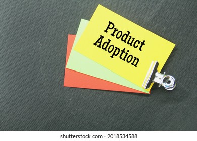 iron clamps, colored paper with the words Product adoption