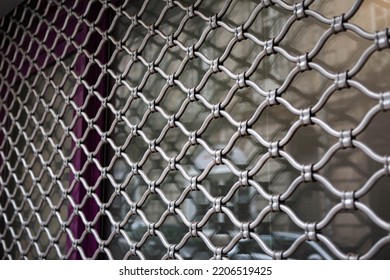 Iron Curtain On The Facade Of A Closed Shop