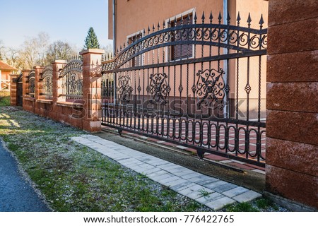 Iron fence with iron gate