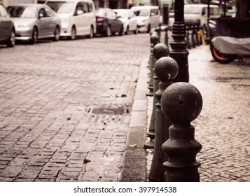 Iron Fence Post Cap, On Sidewalk In Vintage Tone 