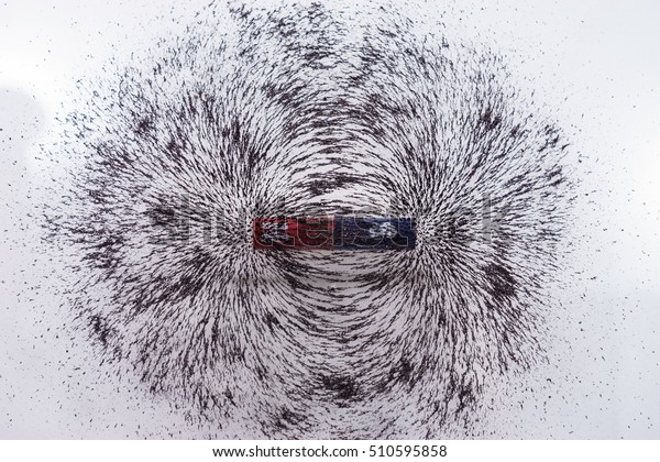 iron filings show magnetic field lines.\
Science Magnetic Field. Physics magnetic\
field