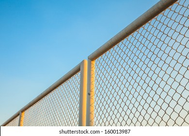 iron hain fence with sky background
