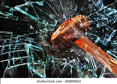 Iron Hammer Breaking Glass Window.