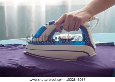 Iron, ironing, shirt, female hand
