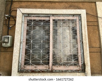 an iron pattern that protects old windows
