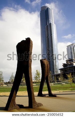 Iron sculptures in Grand Park, Chicago and a skyscraper.