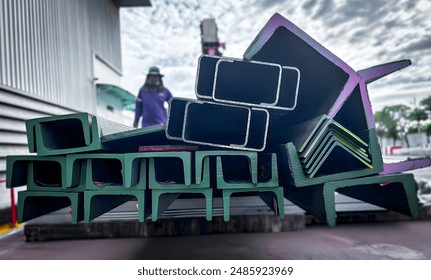 iron steel store in warehouse heavy industry.Steel group for industry  material Product of engineering  construction Factory  metal warehouse industrial,Angle ,beams,C-shaped steel, - Powered by Shutterstock