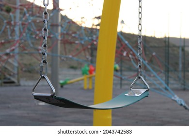 Iron Swing In The Playground. Single Swing. Morning Time For Relax, No People, Beautiful Landscape.