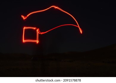 Iron wool circle drawing light fireworks. Burning Steel Wool spinning, Trajectories of burning sparks at night. Movement light effect, steel wool fire hoop. long exposure light painting, Pyrotechnic - Powered by Shutterstock