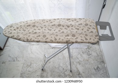 ironing board/table above - Shutterstock ID 1230968950