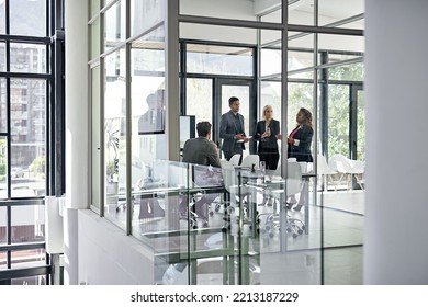 Ironing out the details. Shot of corporate businesspeople meeting in the boardroom. - Shutterstock ID 2213187229