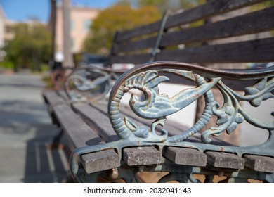 Ironwork On The Armrest Of A Public Bench In Downtown Charleston, SC.