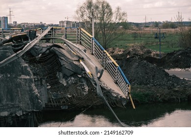Irpin, Ukraine - 04 24 2022: Consequences of the war with Russia in a peaceful city near Kiev, the capital of Ukraine. Destroyed bridge to the city, fires and death. 