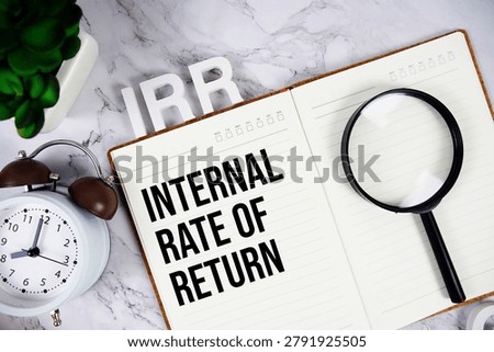 IRR - Internal Rate of Return acronym on notepad, Business concept background