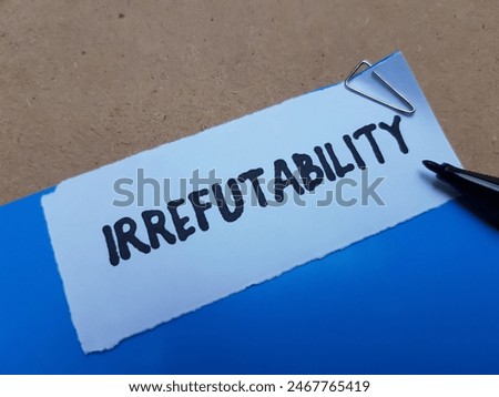 Irrefutability writting on table background.