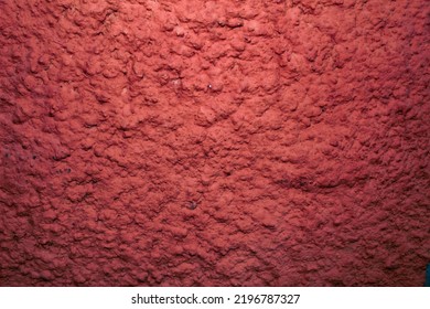 Irregular Surface, In The Color Of Red Clay. Red Earth Texture. Bauxite