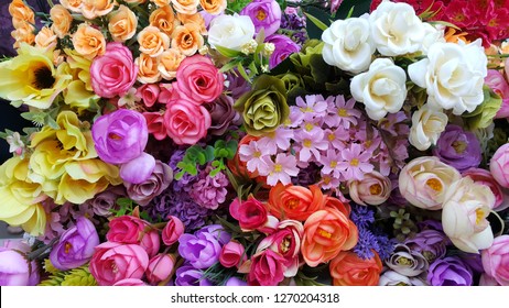 irregularly placed flowers in various colors - Powered by Shutterstock