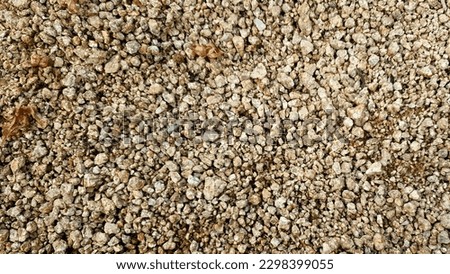Irregularly shaped Decomposed granite soil.