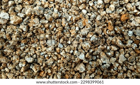 Irregularly shaped Decomposed granite soil.